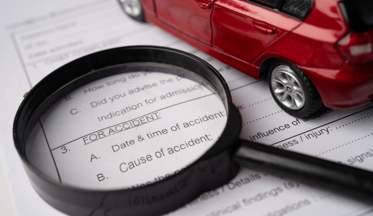 Car Accident Lawsuit showing a damaged vehicle, legal documents, and a judge's gavel representing accident claims and legal action.