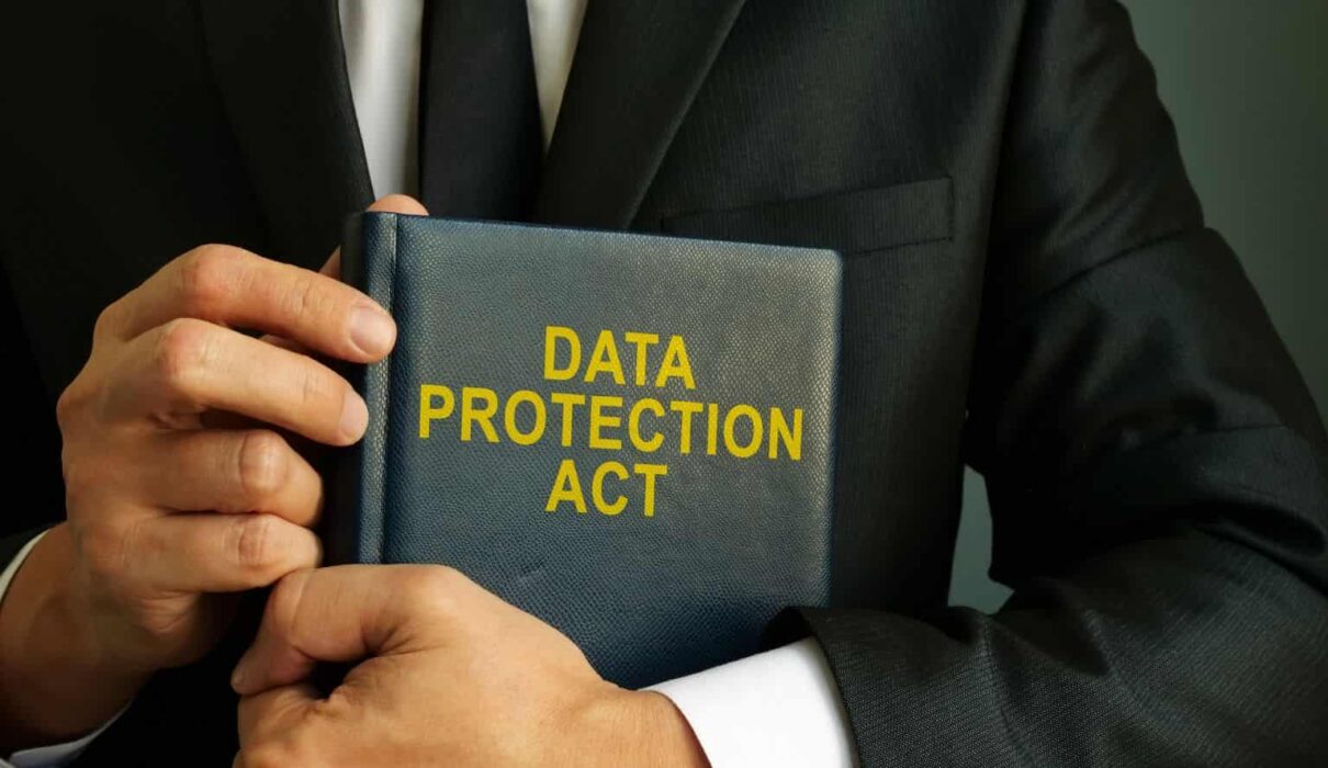 Illustration representing Data Privacy Laws with secure digital data, privacy shield, lock icon, and protected personal information.