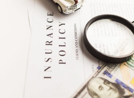 Insurance Claim Disputes illustration showing a policyholder reviewing a denied insurance claim with legal documents and an insurance representative.