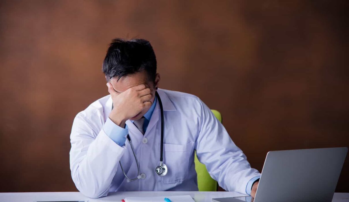 Medical Malpractice Lawsuits concept showing a doctor, patient, medical records, and a courtroom gavel representing healthcare negligence claims.