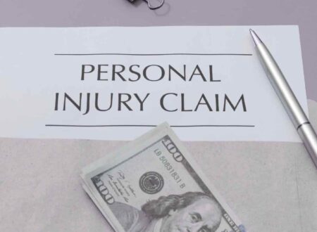 Personal Injury Settlement illustration showing a signed legal agreement, compensation documents, and a lawyer discussing a claim with an injured client.