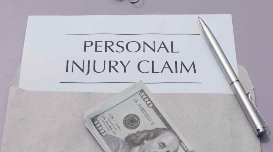 Personal Injury Settlement illustration showing a signed legal agreement, compensation documents, and a lawyer discussing a claim with an injured client.