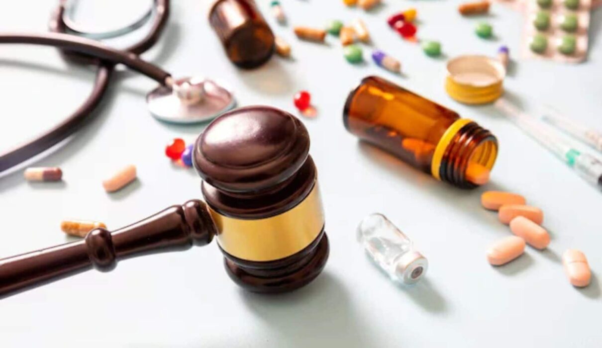 Pharmaceutical Lawsuit concept showing prescription medicine bottles, pills, and legal documents representing a Pharmaceutical Lawsuit over drug safety and consumer claims.