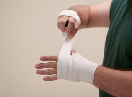 Employee meeting with a lawyer to discuss a workplace injury lawsuit after a job-related accident.