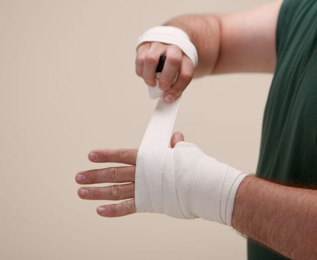 Employee meeting with a lawyer to discuss a workplace injury lawsuit after a job-related accident.