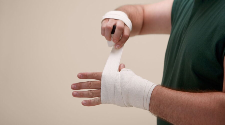 Employee meeting with a lawyer to discuss a workplace injury lawsuit after a job-related accident.