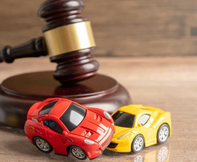 Car Accident Lawsuit involving two damaged vehicles after a serious collision, highlighting a legal claim for injury compensation and insurance disputes.