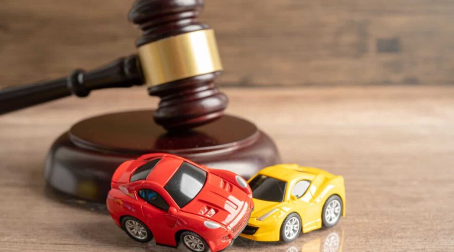 Car Accident Lawsuit involving two damaged vehicles after a serious collision, highlighting a legal claim for injury compensation and insurance disputes.