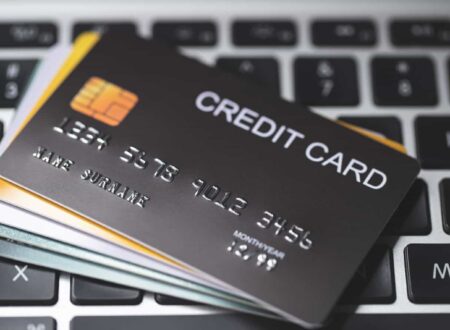 Credit Card Lawsuit showing a consumer reviewing credit card statements and legal documents while consulting with an attorney over a financial dispute.