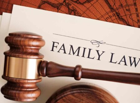 A family meeting with parents and children discussing legal matters with a lawyer, representing Family Law services related to divorce, child custody, adoption, and family rights.