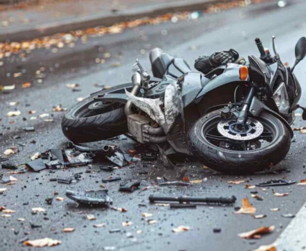 Motorcycle Accident Compensation claim consultation showing an injured rider discussing legal options and financial recovery after a traffic accident.