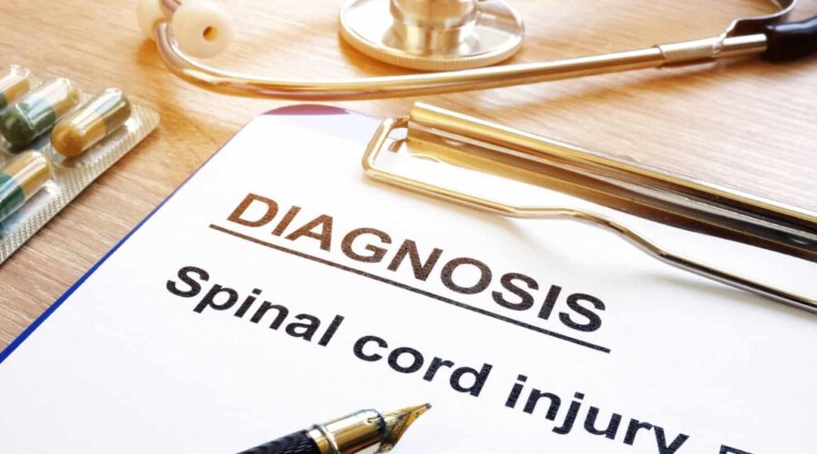 A person undergoing rehabilitation after a serious accident, highlighting Spinal Cord Injury Claims and the legal process of seeking compensation for long-term medical care and recovery.