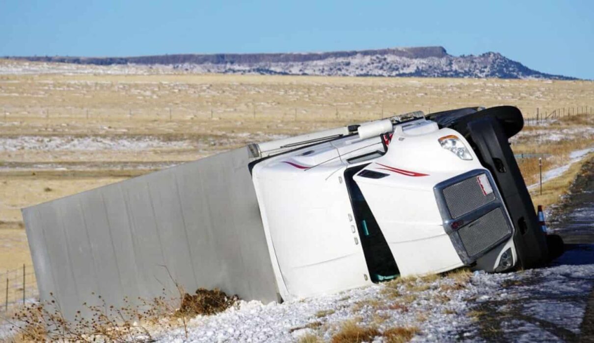 Truck Accident Lawsuits involving a damaged commercial truck after a highway collision with legal claims for injury compensation.