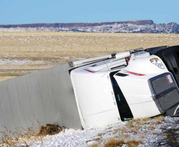 Truck Accident Lawsuits involving a damaged commercial truck after a highway collision with legal claims for injury compensation.