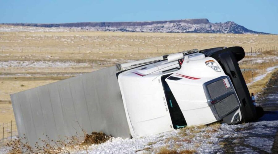 Truck Accident Lawsuits involving a damaged commercial truck after a highway collision with legal claims for injury compensation.