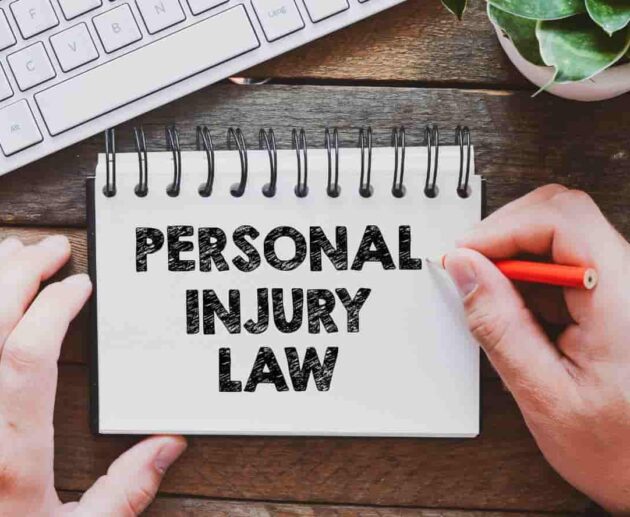 Personal injury lawsuit consultation showing an injured individual reviewing legal documents with an attorney to discuss compensation and legal rights.