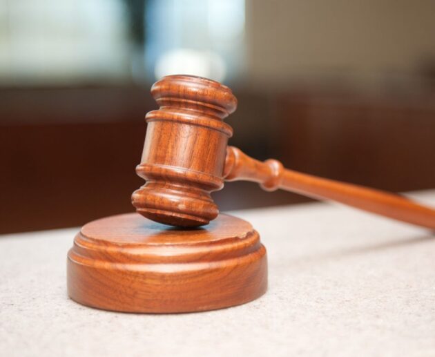 Illustration depicting the Isotonix lawsuit, featuring dietary supplement products, legal documents, a judge's gavel, and consumer protection concerns.