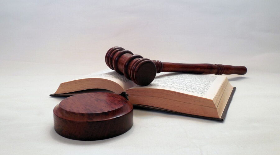 Illustration representing the Janice Griffith lawsuit with a courtroom setting, legal documents, and a judge's gavel symbolizing legal proceedings and liability concerns.