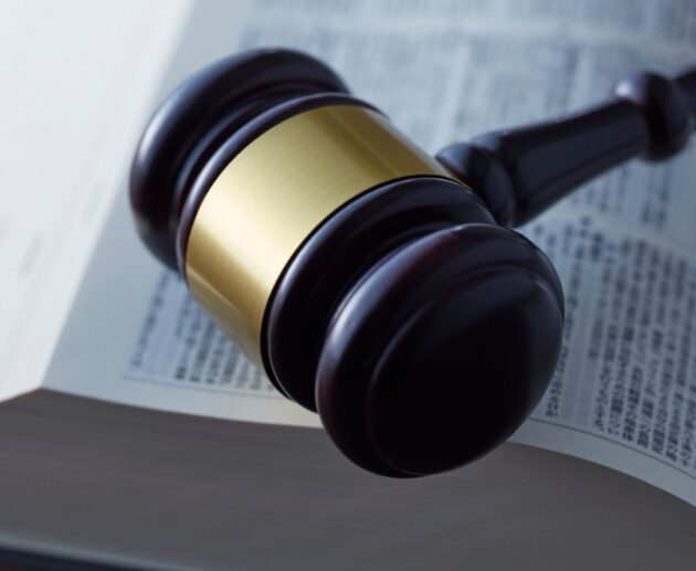 Method Body Wash lawsuit illustration featuring product bottle, legal documents, and courthouse imagery