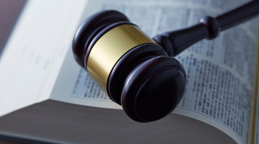 Method Body Wash lawsuit illustration featuring product bottle, legal documents, and courthouse imagery