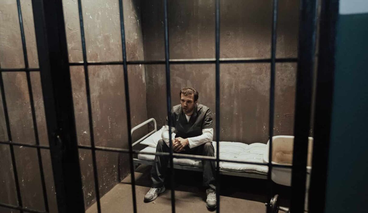 Aggravated Assault Sentence courtroom scene showing a judge delivering a criminal sentence while the defendant stands before the bench.