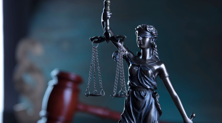 What Is Battery in Law illustration showing one person intentionally making unlawful physical contact with another to explain the legal concept of battery.