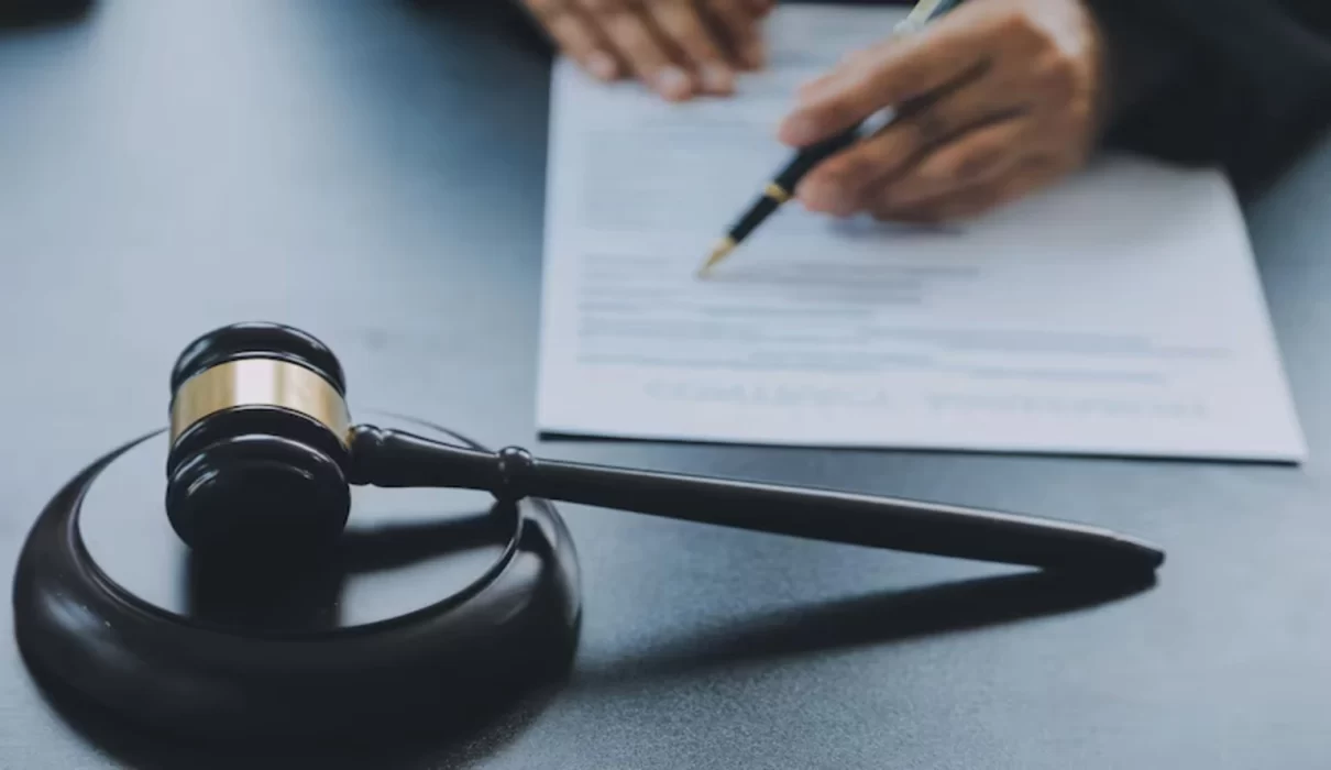 Gavel and legal documents representing research into the Market America Lawsuit