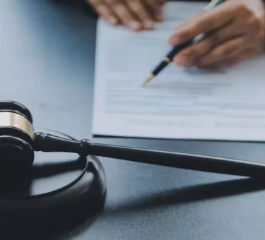 Gavel and legal documents representing research into the Market America Lawsuit