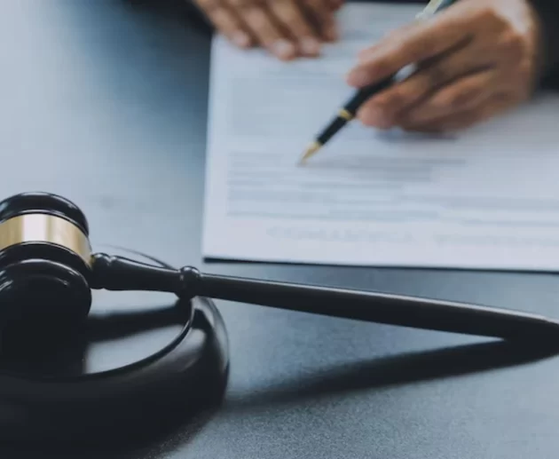 Gavel and legal documents representing research into the Market America Lawsuit