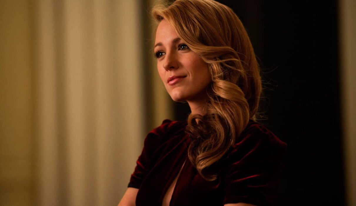 Blake Lively Lawsuit news coverage showing courtroom gavel and legal documents representing the Baldoni settlement case