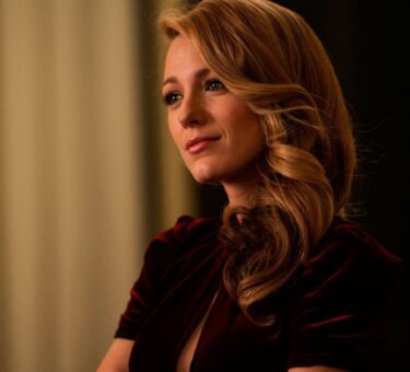 Blake Lively Lawsuit news coverage showing courtroom gavel and legal documents representing the Baldoni settlement case
