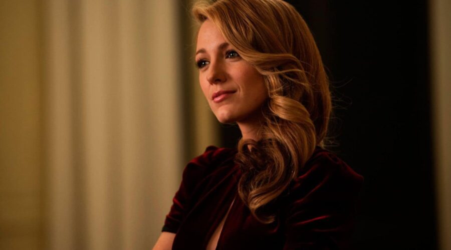 Blake Lively Lawsuit news coverage showing courtroom gavel and legal documents representing the Baldoni settlement case