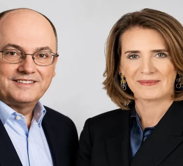 Steve Cohen and Ruth Porat net worth and earnings comparison graphic
