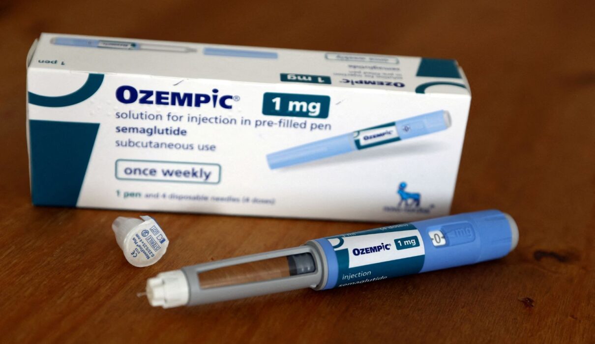 Gavel and Ozempic injection pen representing an Ozempic lawsuit for gastroparesis and injury claims