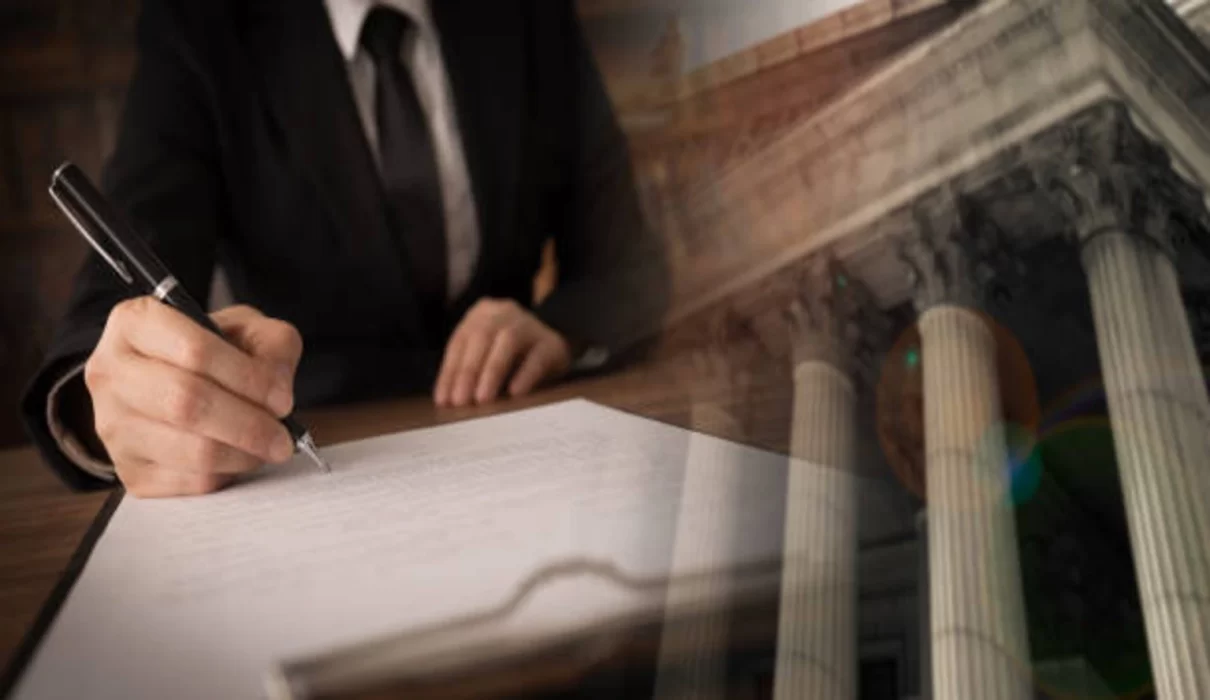 Gavel and medical mesh implant beside courtroom documents representing a hernia mesh lawsuit
