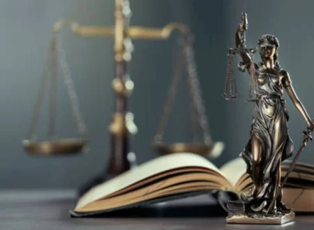 Gavel and legal documents beside a bottle of paraquat herbicide, representing the Paraquat Lawsuit