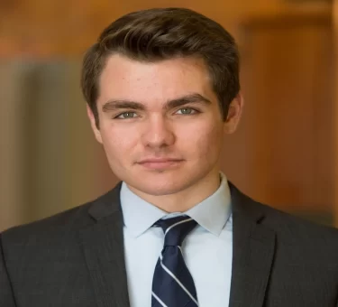 Nick Fuentes net worth article featured graphic with income source icons