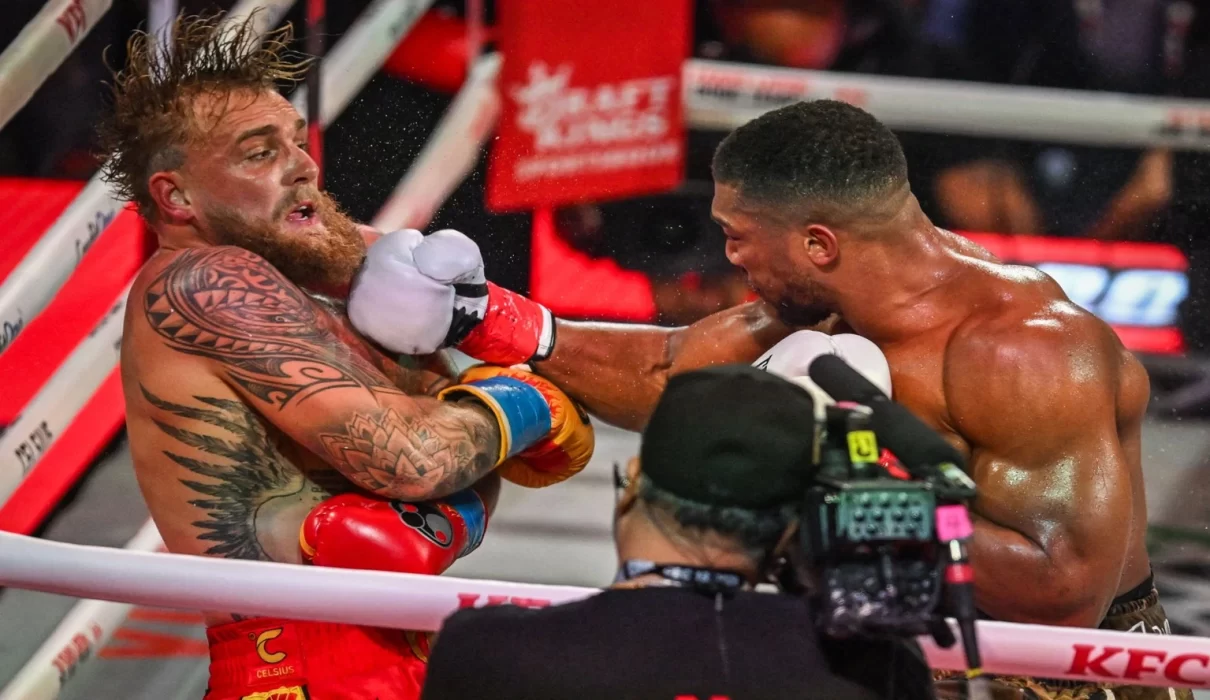 Jake Paul and Anthony Joshua during their December 2025 boxing match amid fight fixing controversy