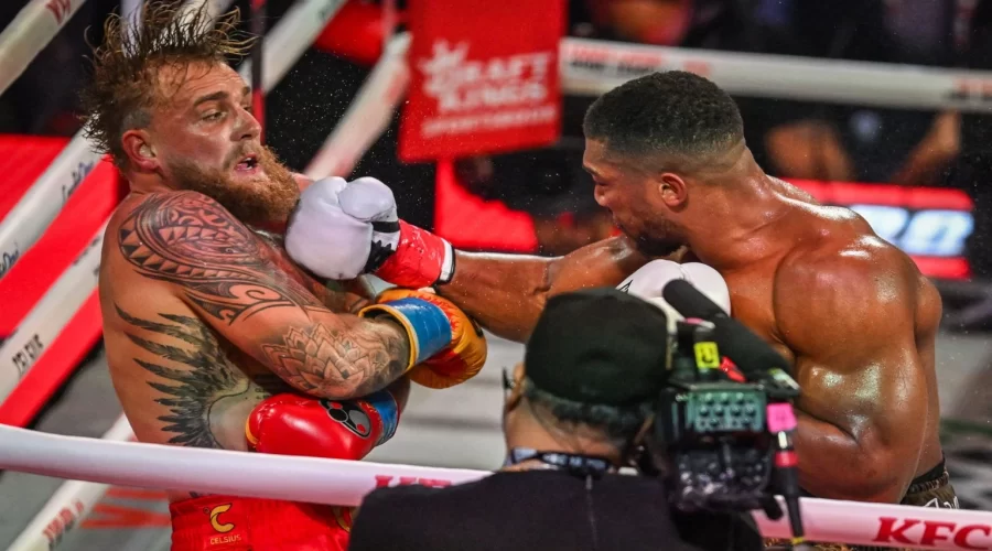 Jake Paul and Anthony Joshua during their December 2025 boxing match amid fight fixing controversy