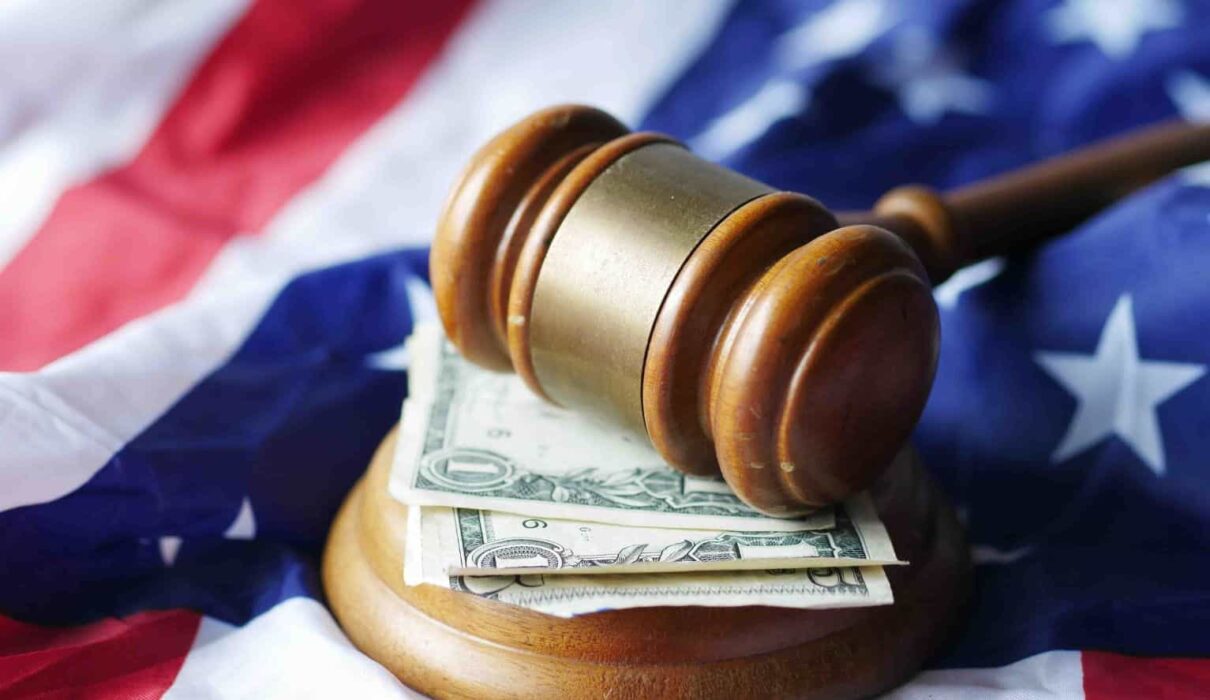 Rael Pads Lawsuit gavel and organic feminine hygiene product packaging representing ongoing consumer litigation.