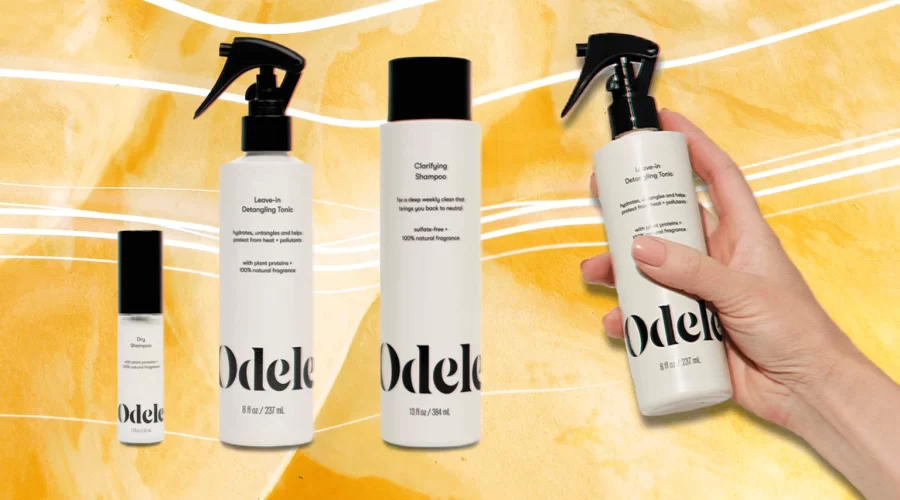 Magnifying glass over a shampoo ingredient list beside an unlabeled bottle, representing Odele shampoo lawsuit research