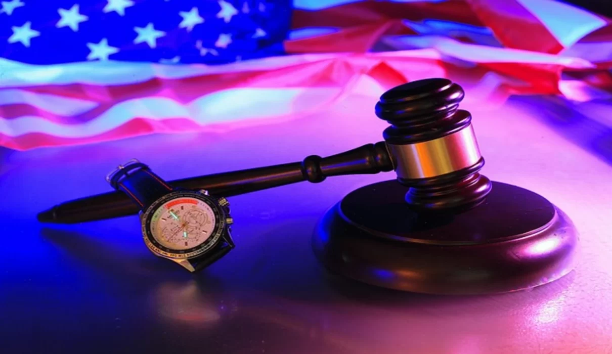 Gavel resting on a legal docket beside court documents