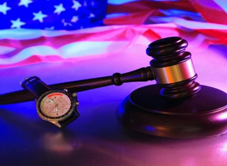 Gavel resting on a legal docket beside court documents